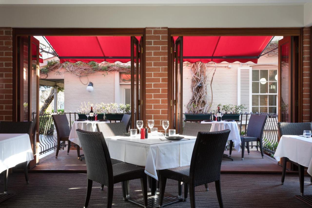 Отель Ramada By Wyndham Brisbane Windsor Экстерьер фото